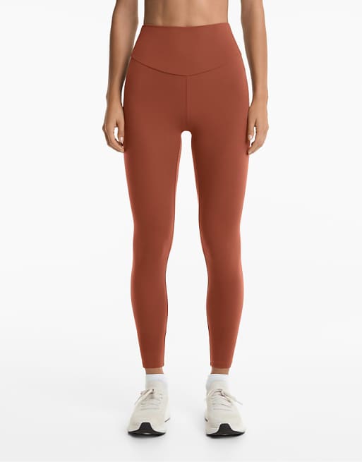 OYSHO Comfortlux high-rise ankle-length leggings in brown tile red