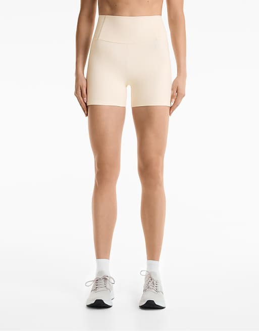 OYSHO Compressive high rise 10cm hot pants in pale ecru