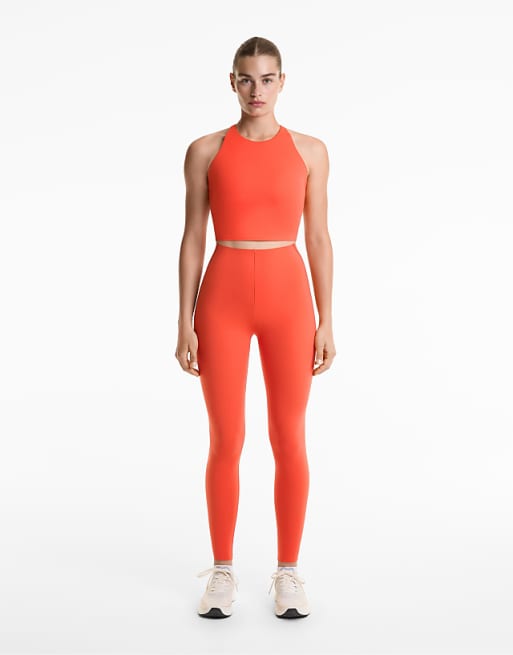 OYSHO Compressive Reflective High Rise Ankle-length Leggings In Orange