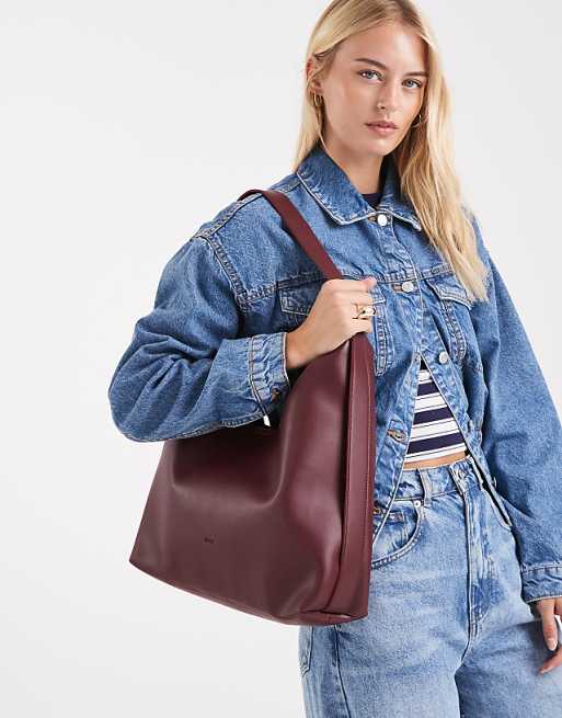 PASQ slouch tote bag with strap detail in burgundy