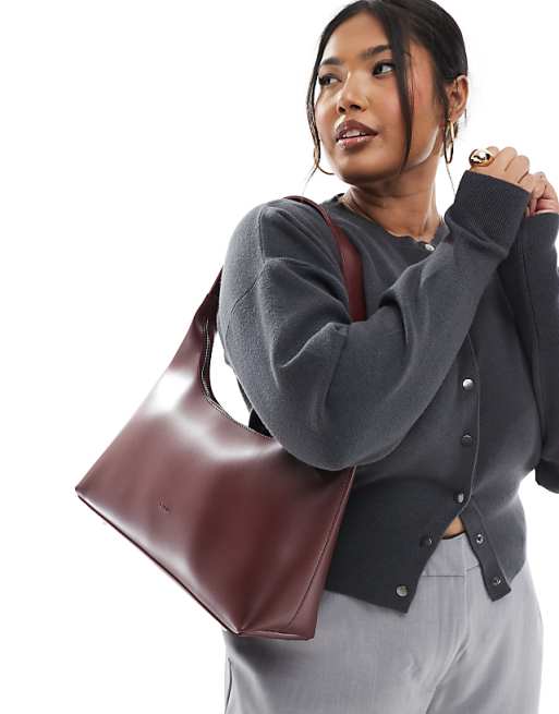 PASQ structured shoulder bag in burgundy