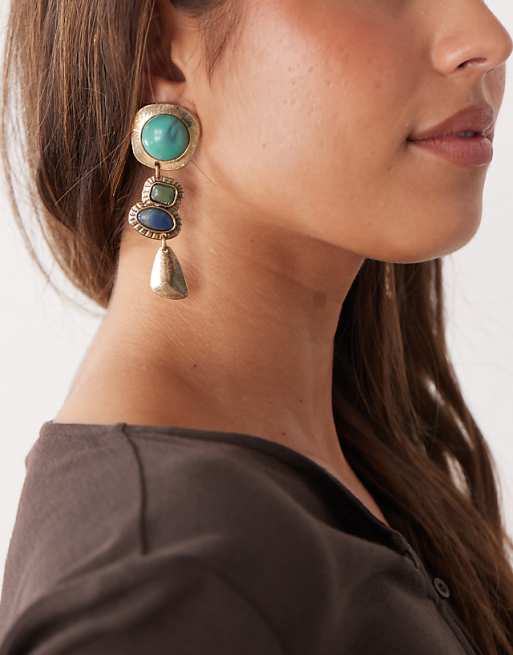 Petit Moments tacoma statement drop earrings in gold and blue stone