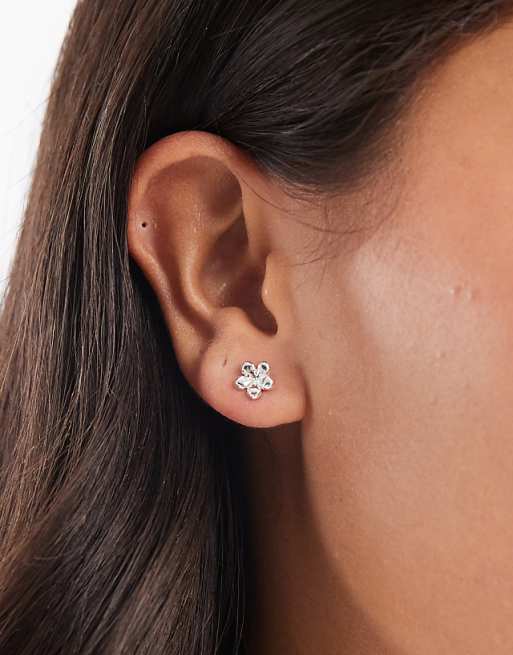 Pieces 18k plated flower studs in silver tone