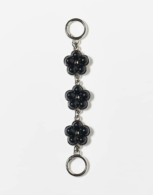 Reclaimed Vintage bag charm and key ring with black flowers in silver