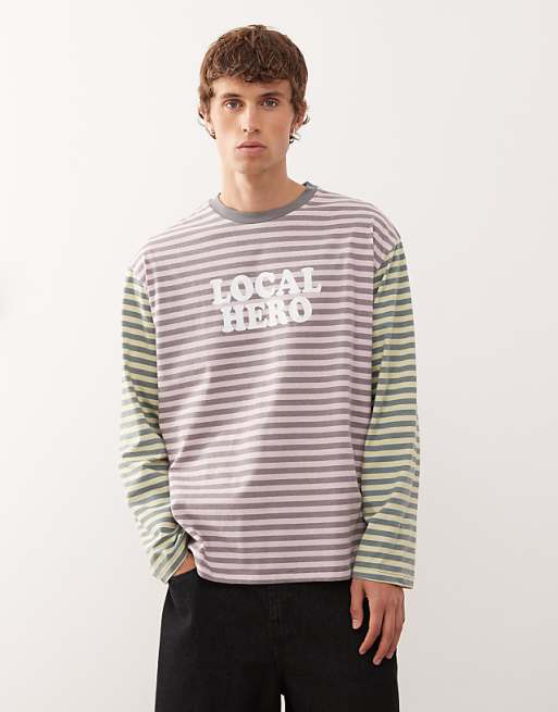 Reclaimed Vintage mixed multi stripe long sleeve tee with branding graphic in multi
