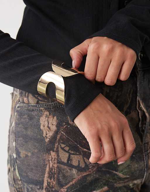 Reclaimed Vintage oversized knot bangle in gold