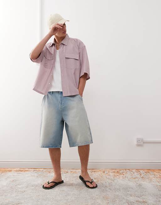 Reclaimed Vintage oversized longline denim jort in light blue faded wash
