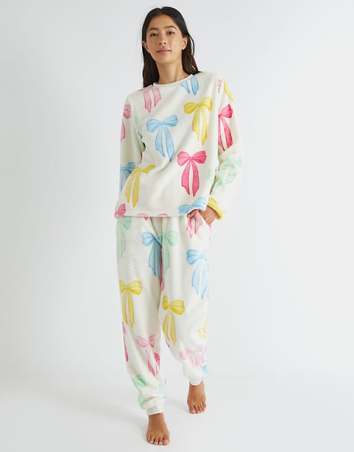 Skinnydip london multicolour bow twosie fleece pyjama set in pink