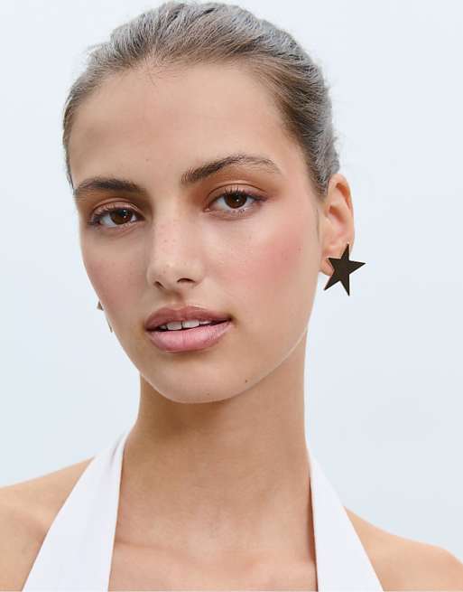 Stradivarius Star earrings in gold