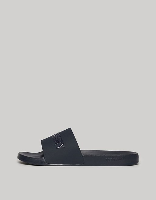 Superdry Vegan logo pool sliders in rich navy/rich navy