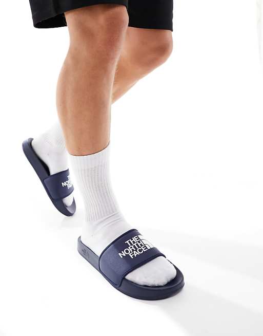 The North Face Base Camp III slides in navy and white