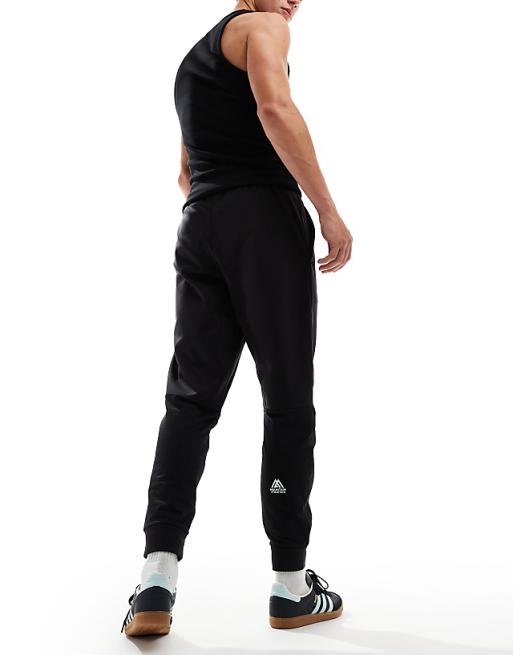 The North Face Mountain Athletics Logo Joggers In Black