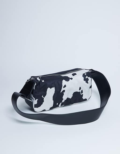 Topshop Kylie Nylon Cross Body With Contrast Strap In Cow Print