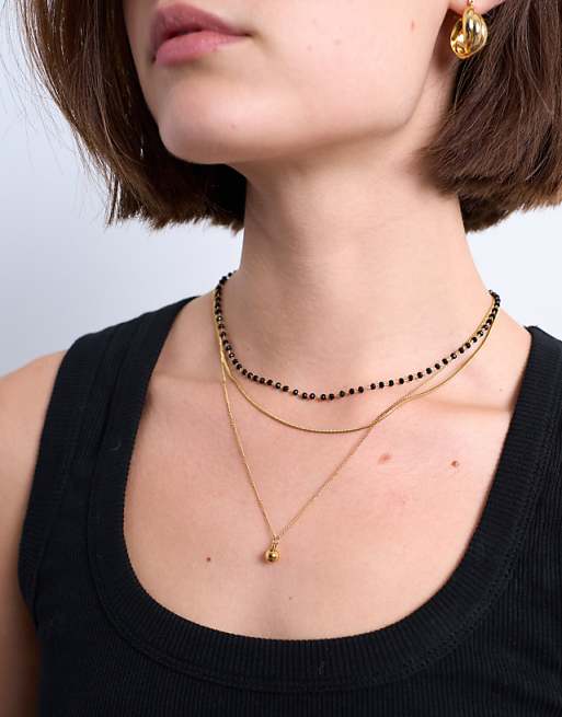Topshop Maddox stainless steel multi chain necklace with black beads in gold