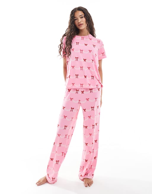 Urban Threads Christmas short sleeve revere and trouser pyjama set in festive bow print
